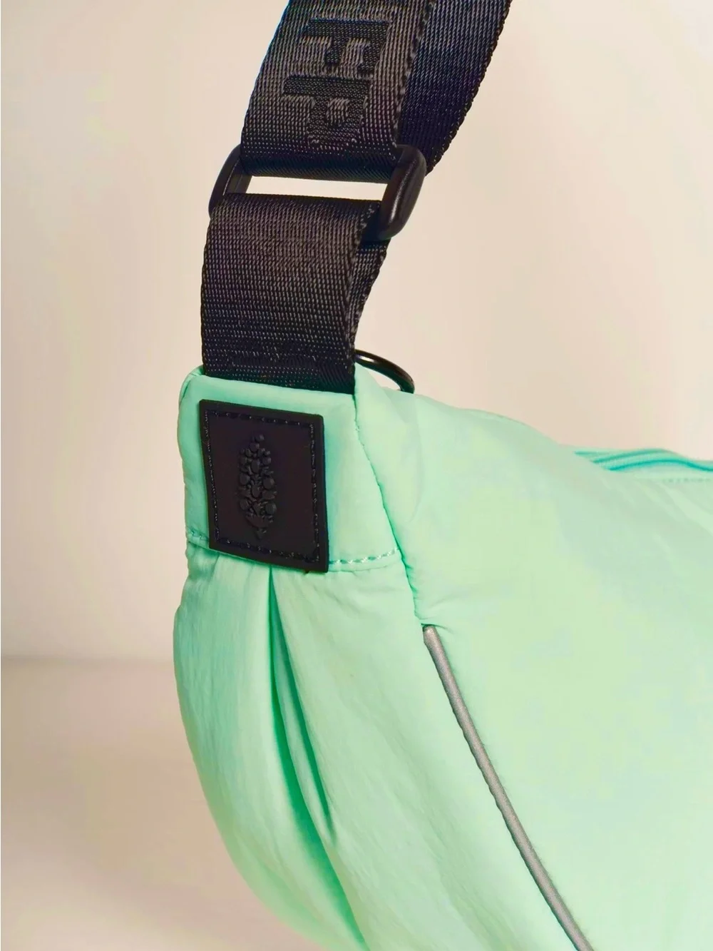 NWT FREE PEOPLE MOVEMENT BULL’S EYE CROSSBODY SLING BAG COLOR IS PISTACHIO!!